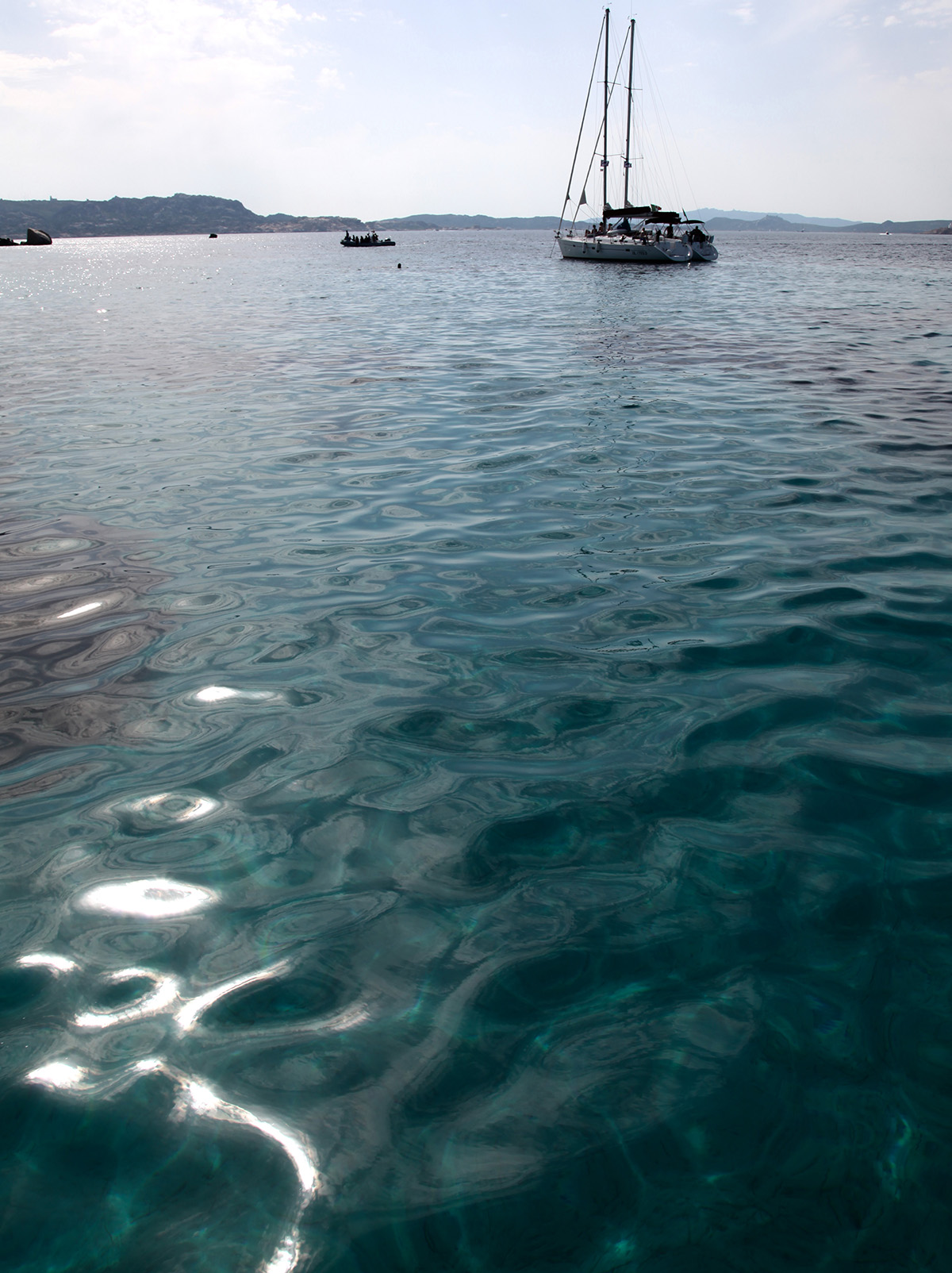 Clear warm seas, large yachts and super yachts, power boats and RIBS