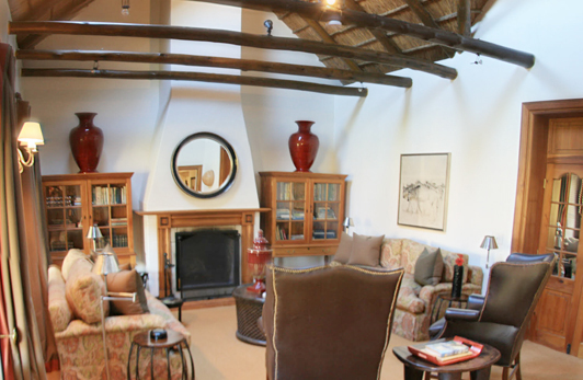 Lounge to a bedroom in South Africa's Bushmans Kloof hotel which marries European sophistication to local architectural construction